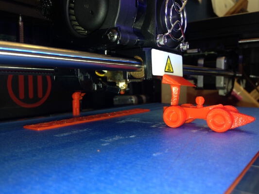 Toy Racecar Getting Pushed off the Build Plate | 3d print model