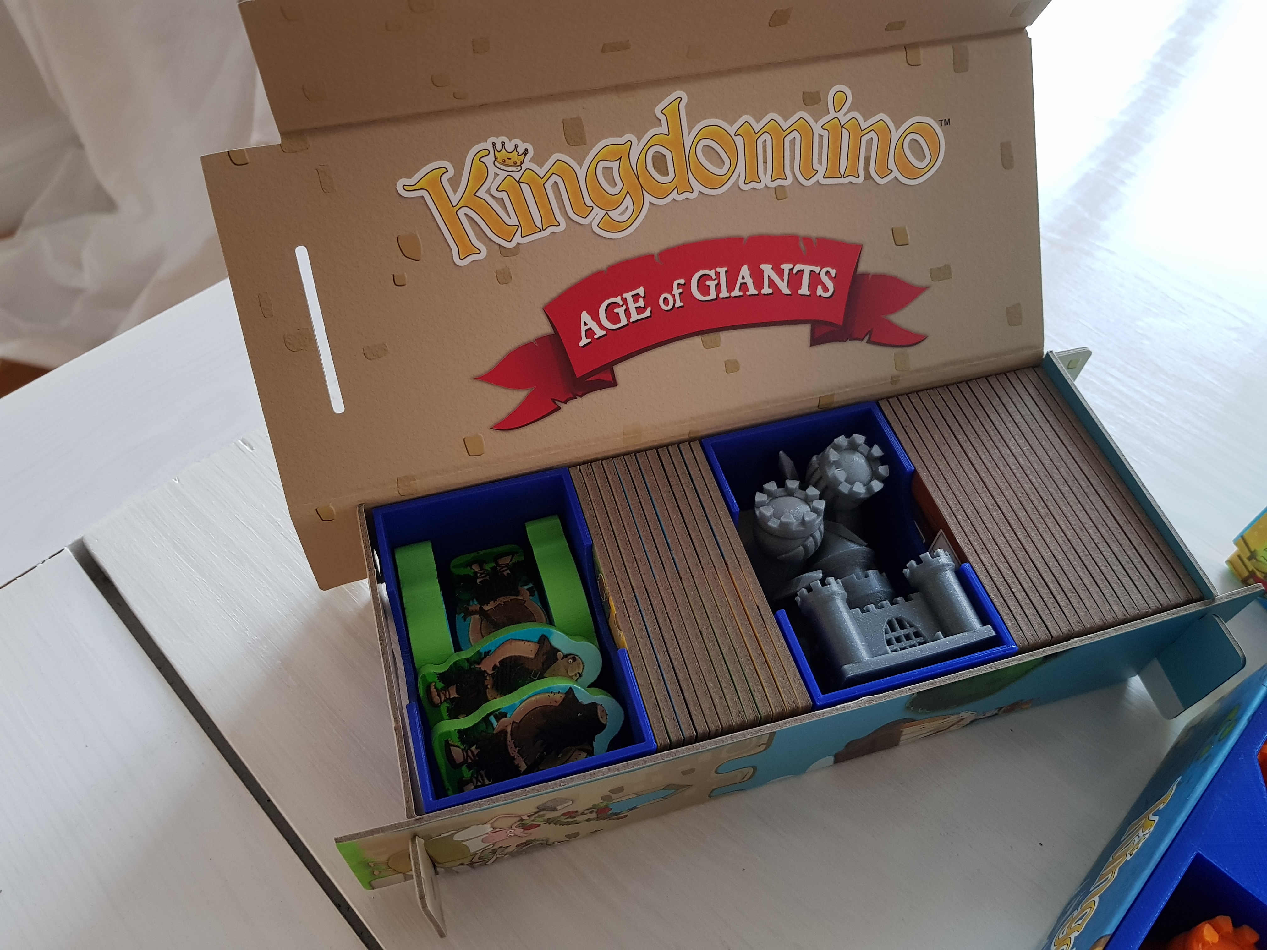 Kingdomino and Age of Giants boxes