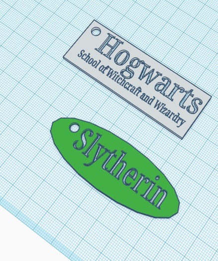 Hogwarts School Key-chain and Slytherin Key-chain!!! Super cool :)