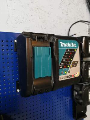 Makita charger holder for metric pegboard (needs magnets) | 3d print model