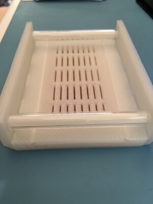 Spool roller with desiccant for Rubbermaid 21 cup (5 liter) storage container | 3d print model