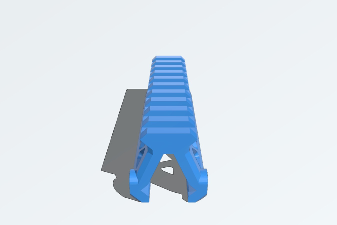 picatinny rail riser with triangular cut outs.