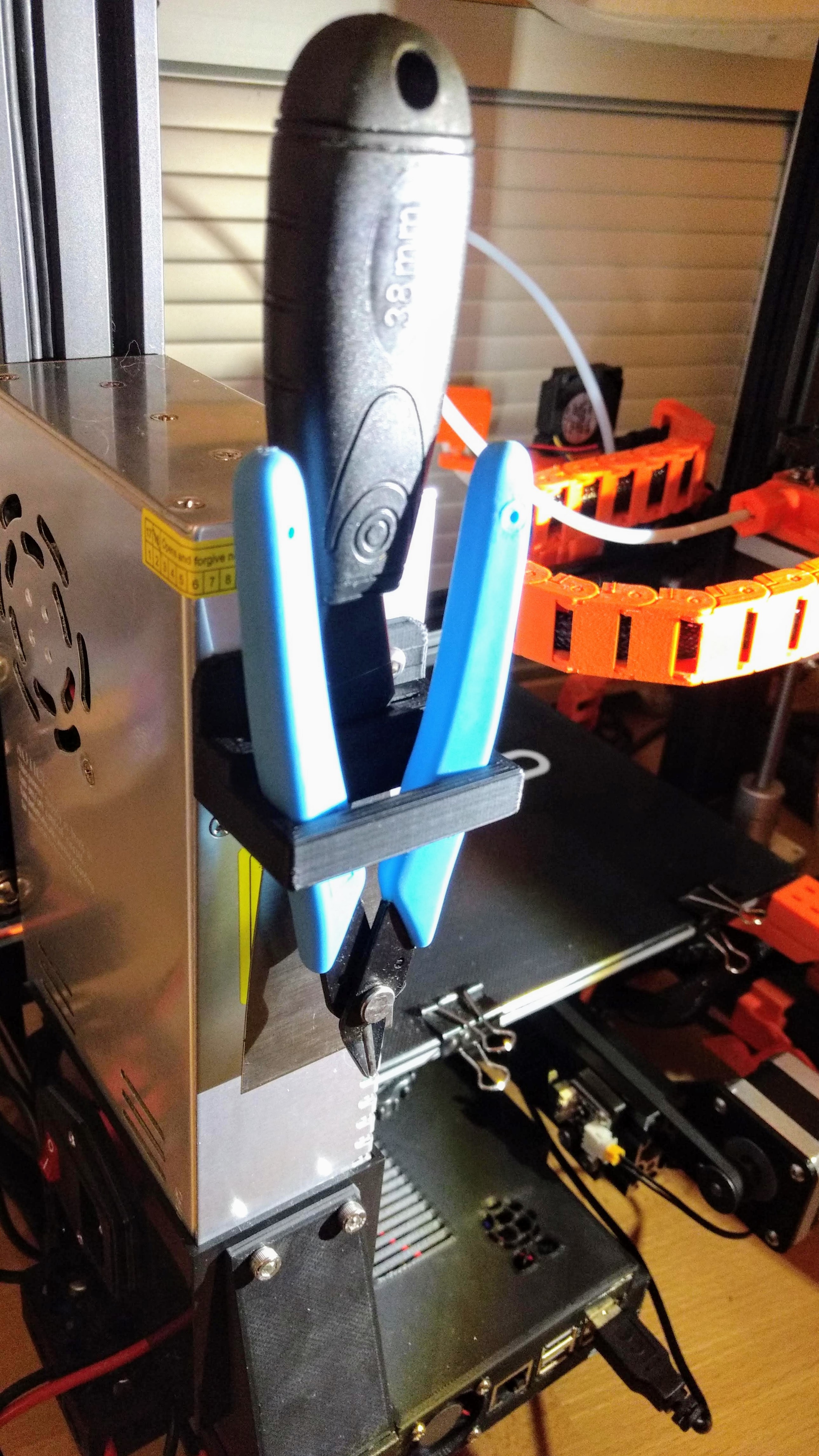 Spatula and Pliers Holder to screw to PSU (Ender 3, CR10 and others)