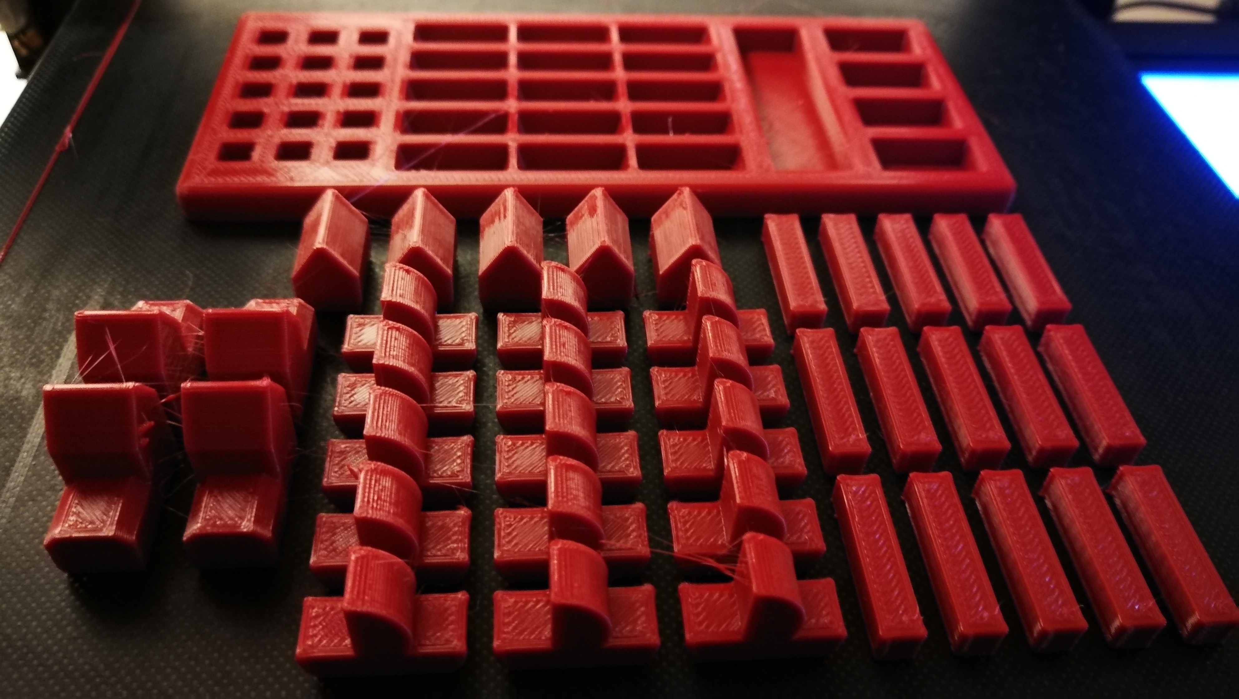 Catan Seafarers expansion pack pieces with a piece holder