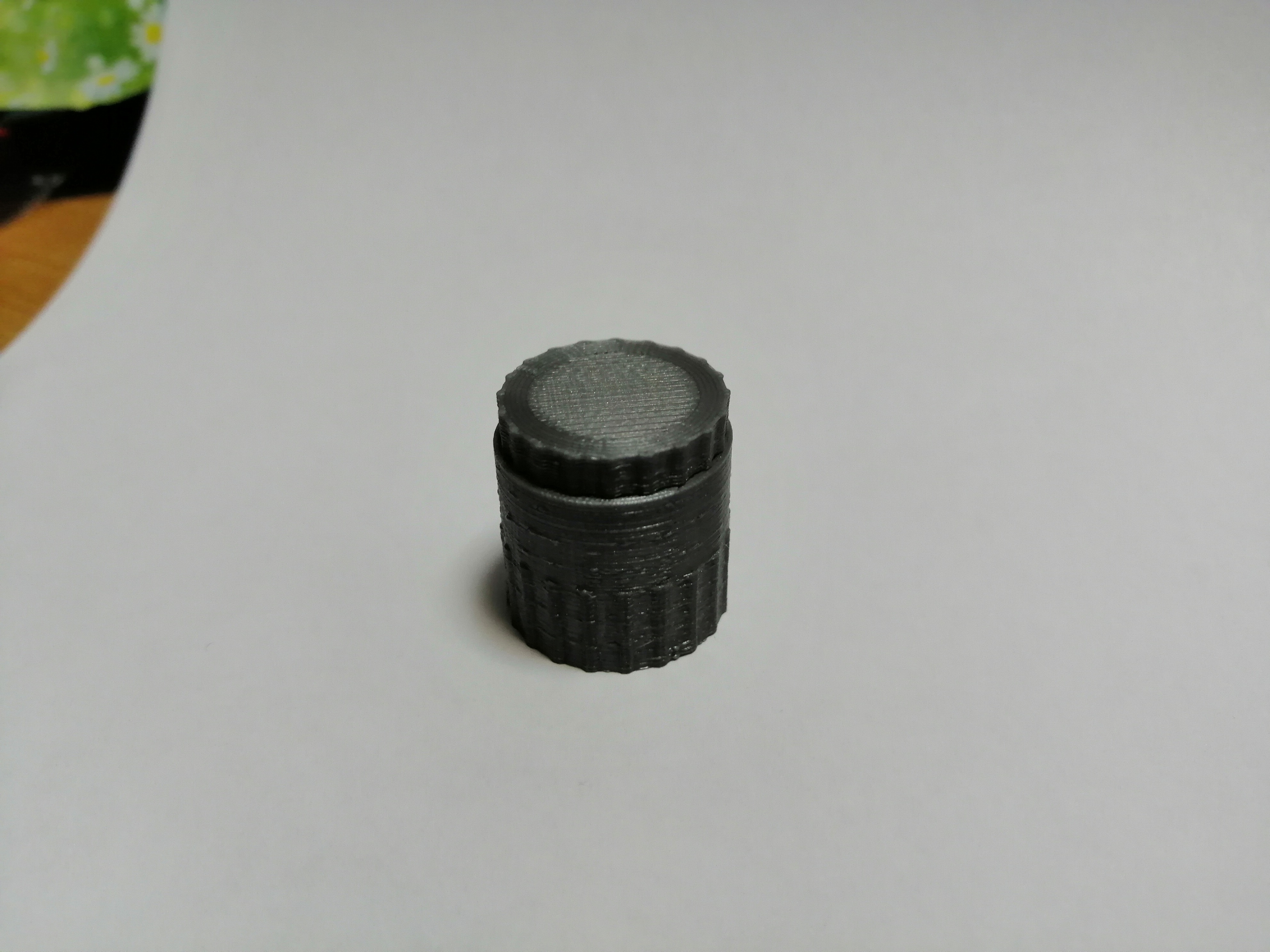 Micro SD card container or keyring.