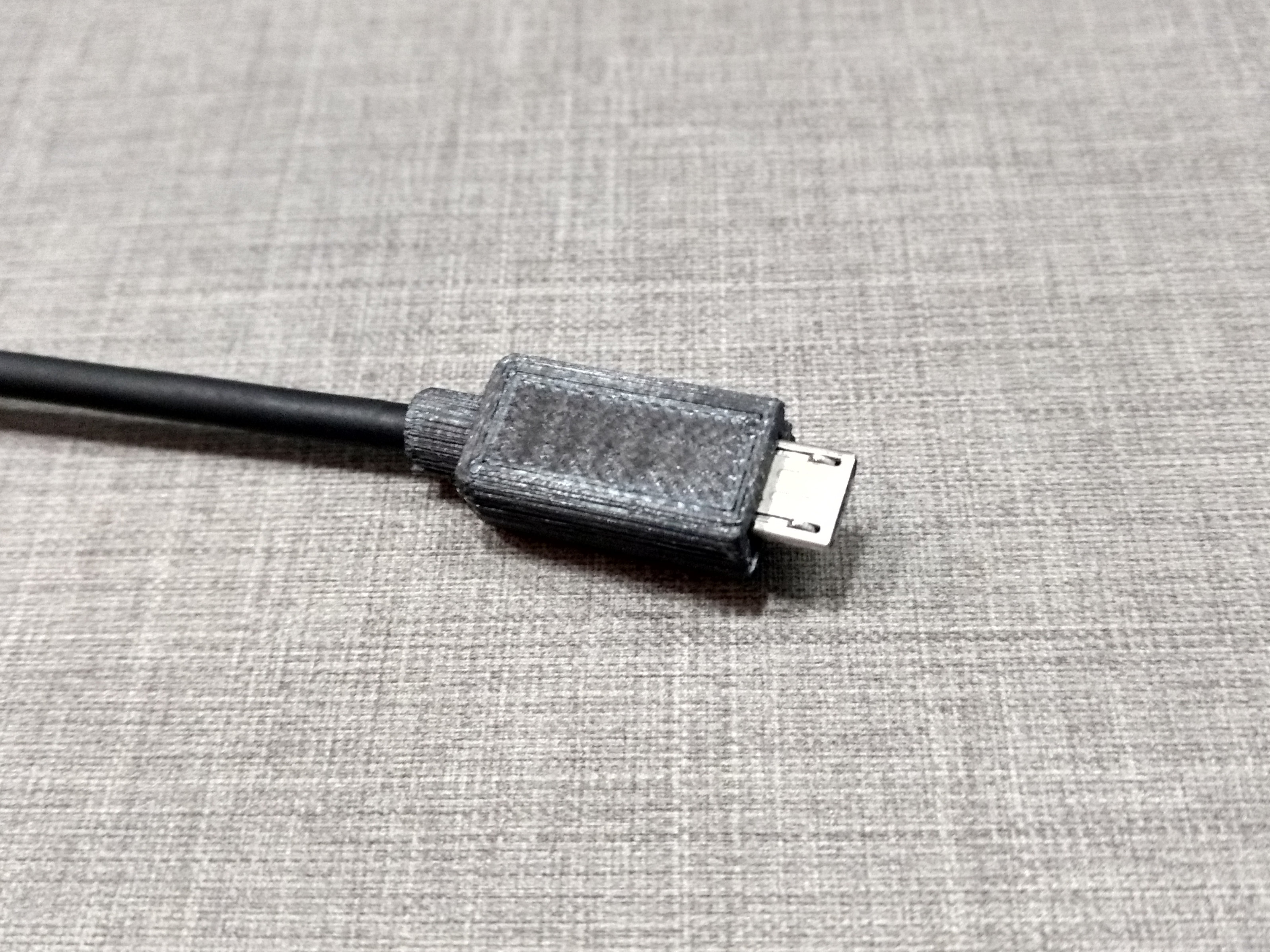 Micro USB plug enclosure