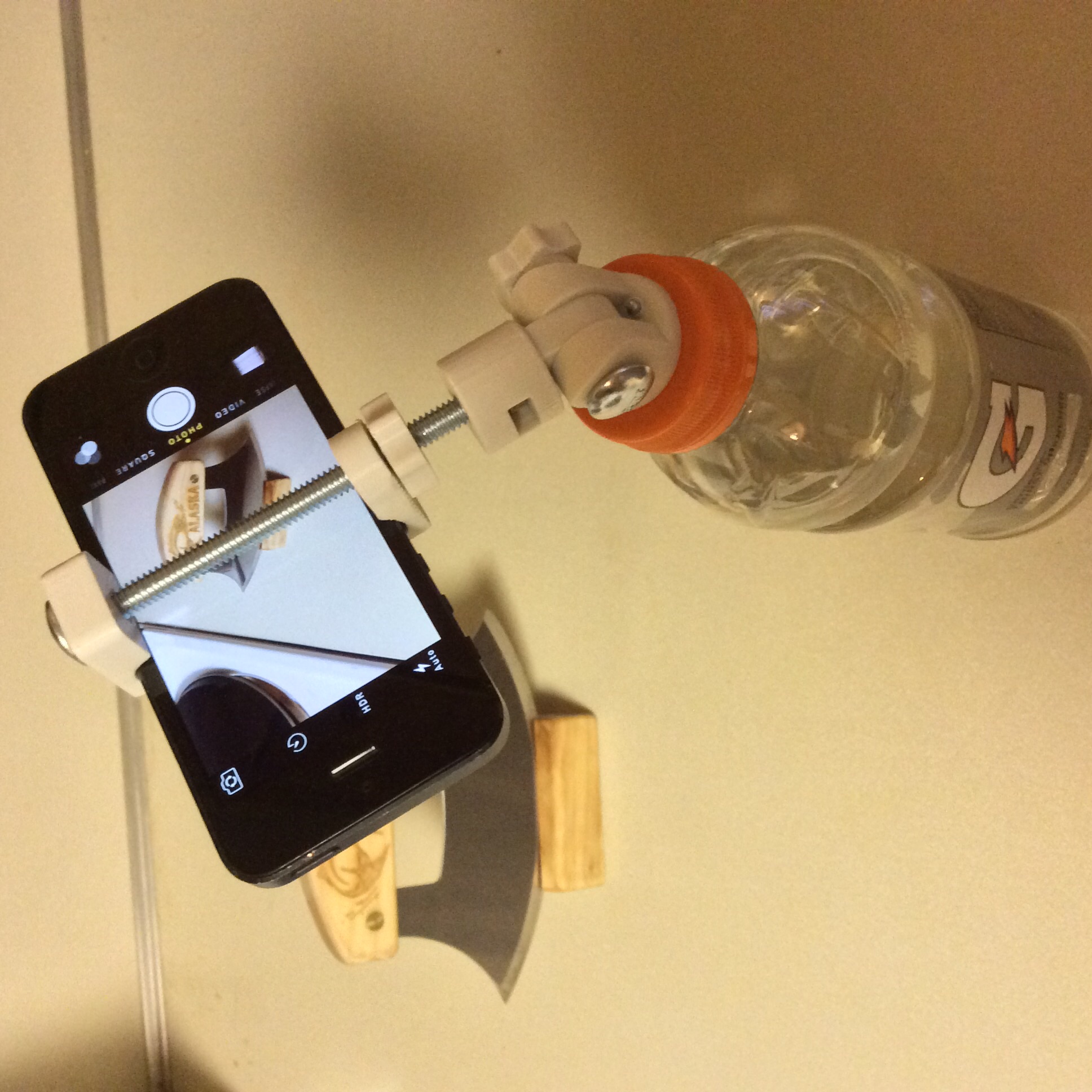 Americanized universal bottle top tripod
