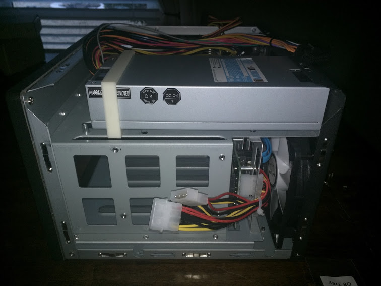 Spacer Bracket for a 1U Power Supply