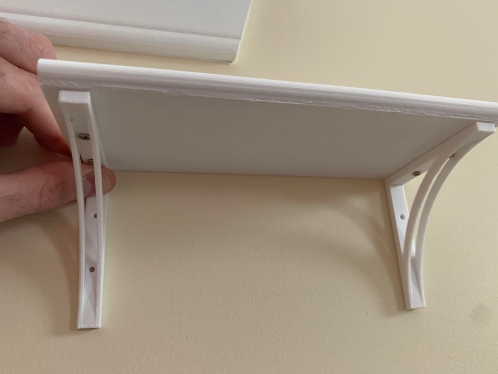 Micro shelf with brackets and lip
