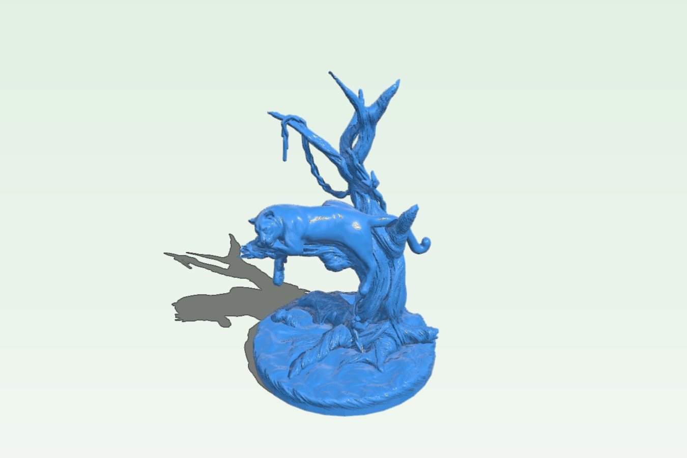 Leopard on tree statue