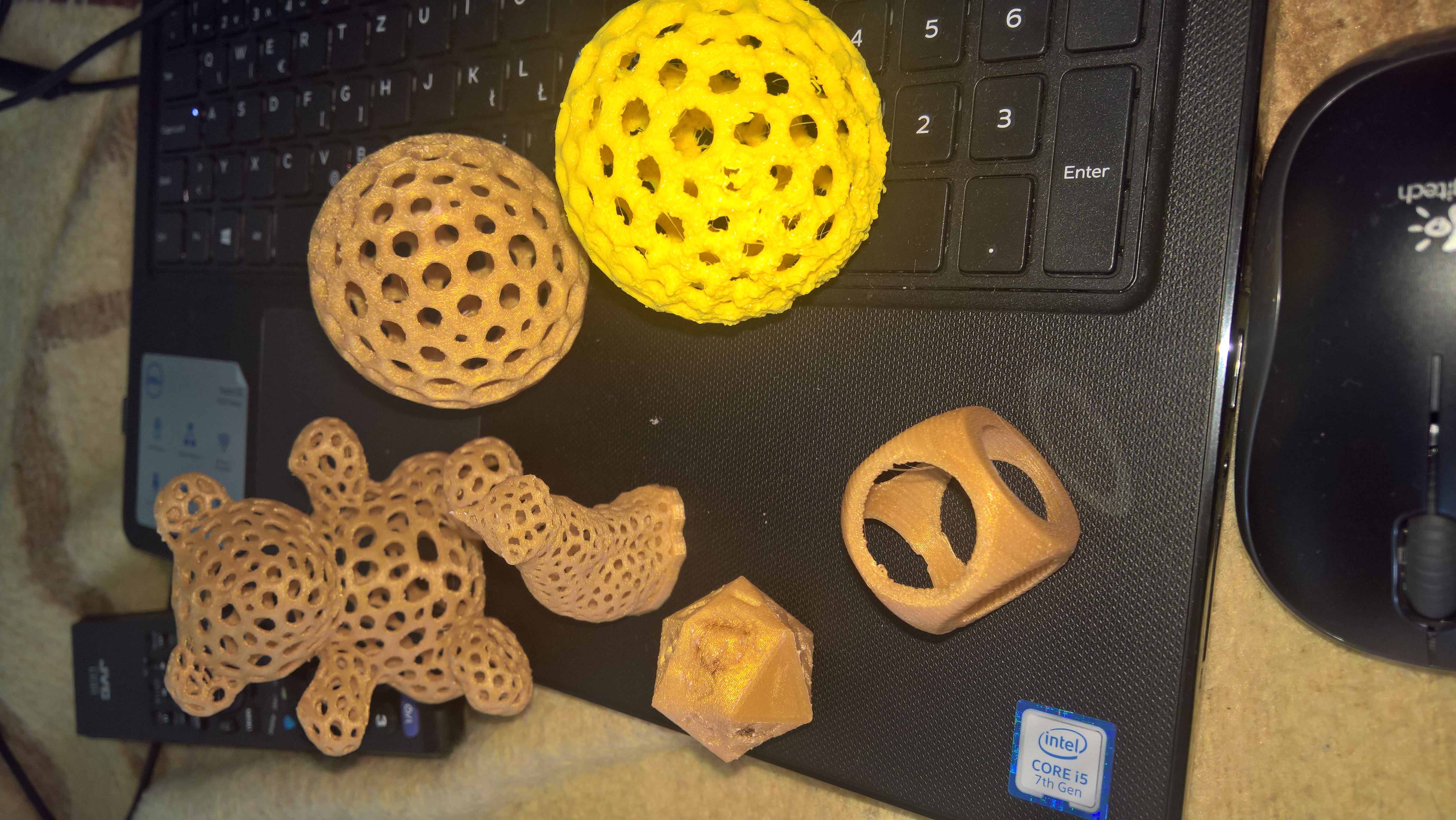 a cube cut with a sphere with holes