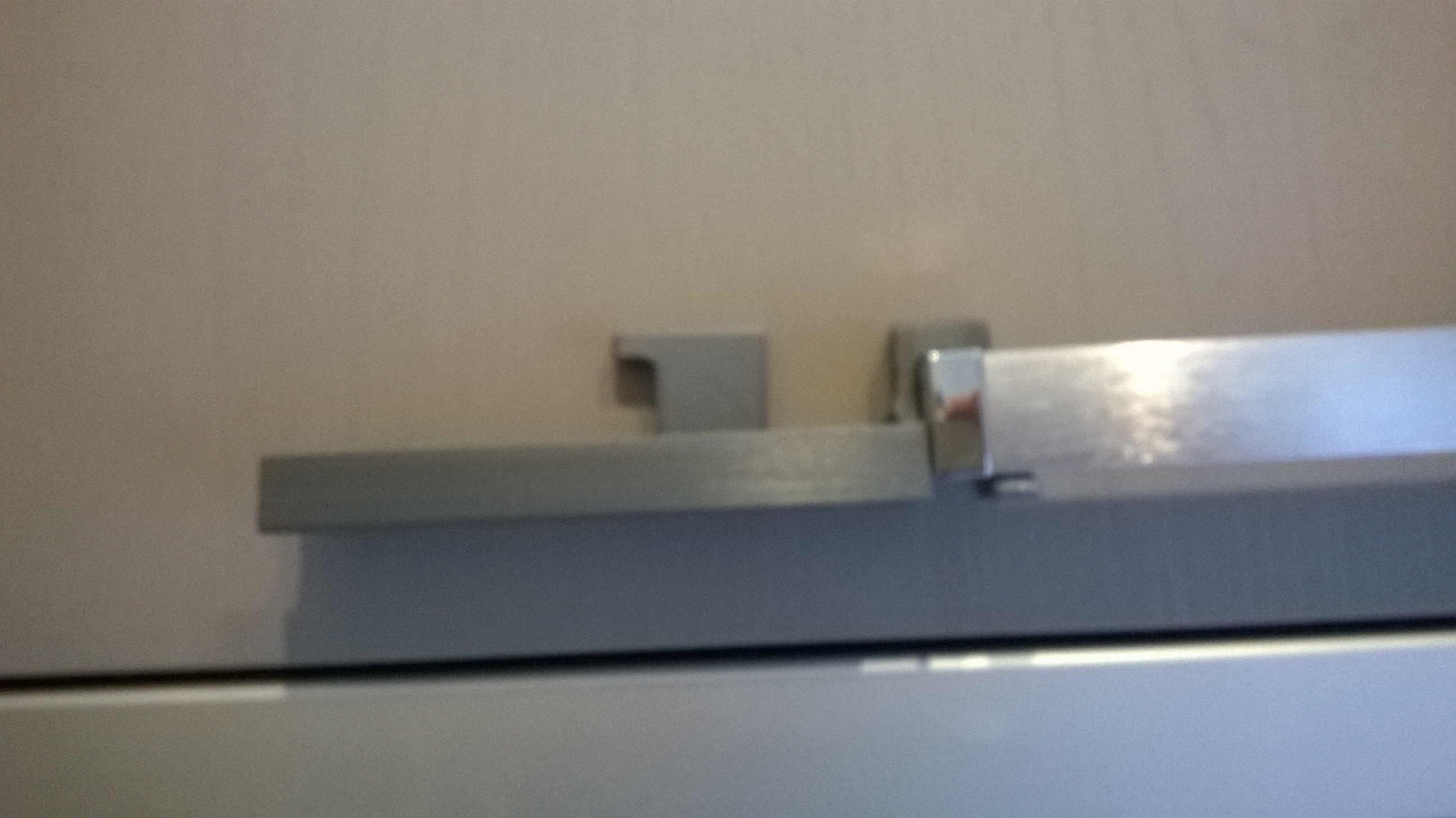 Tablet cabinet holder V2