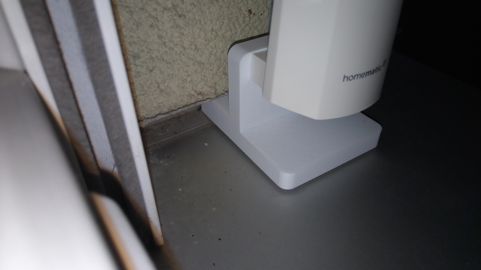 Homematic IP outdoor sensor: holder for windowsill (HmIP-STHO)