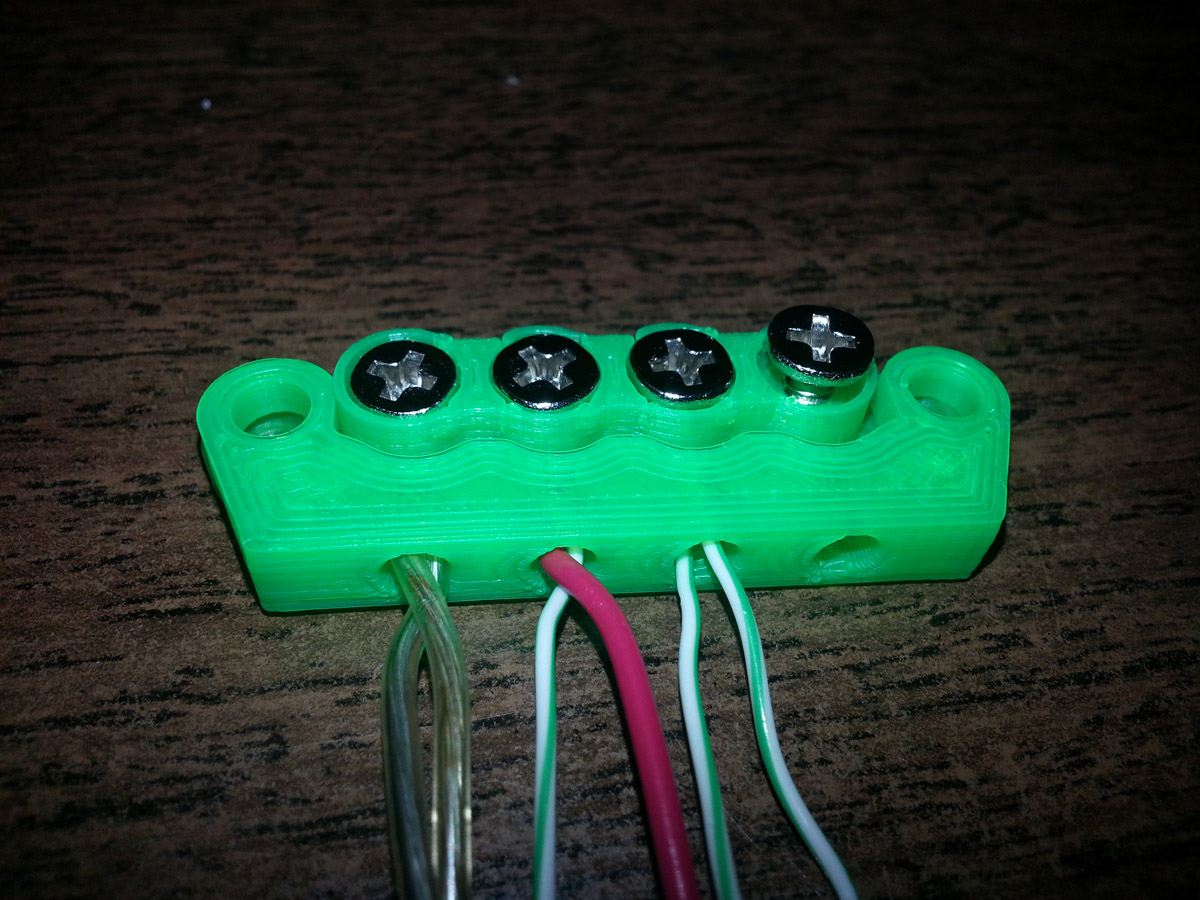Compact Terminal Strip With Optional Strain Relief.