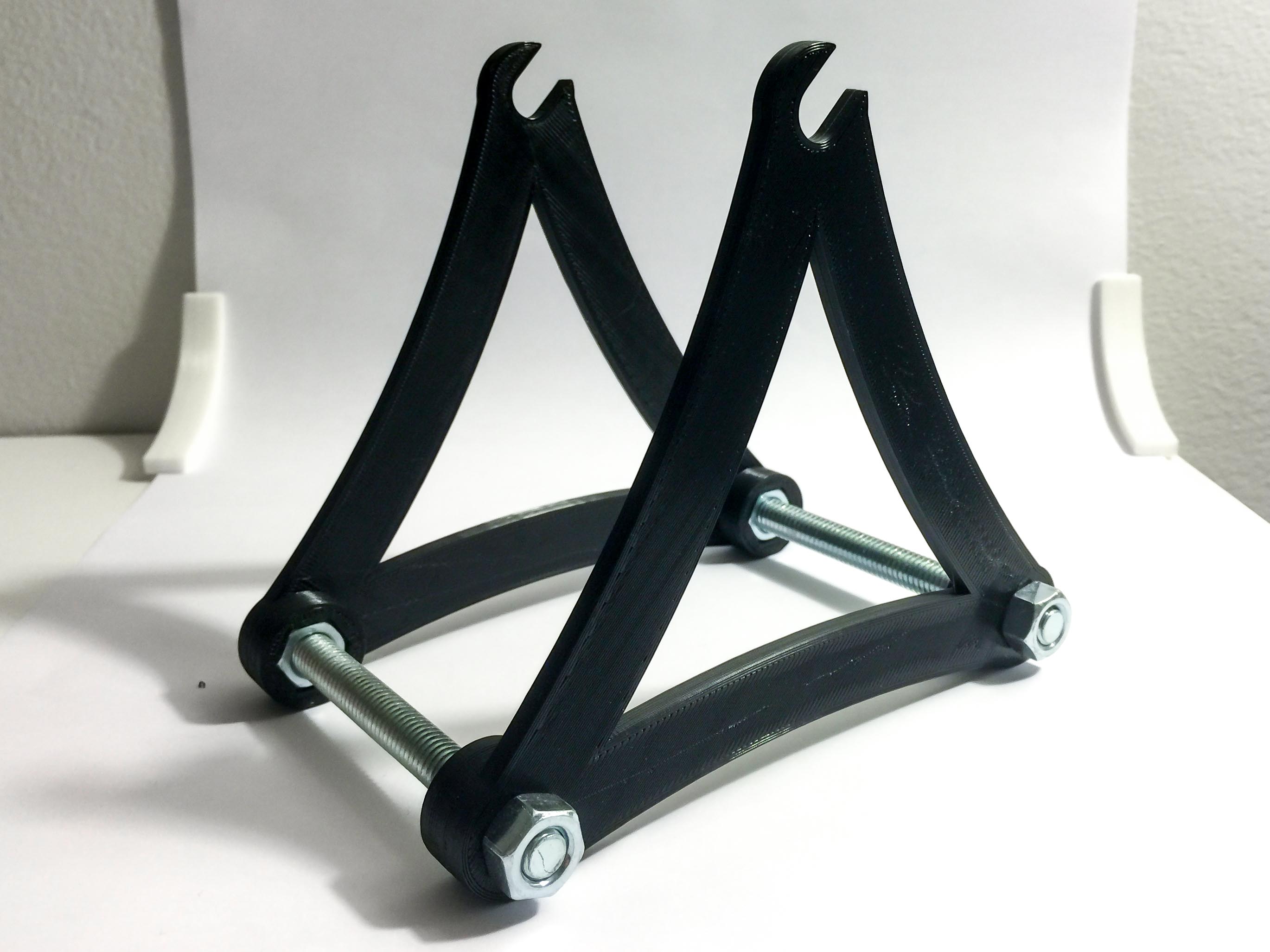 Wall-mounted spool holder