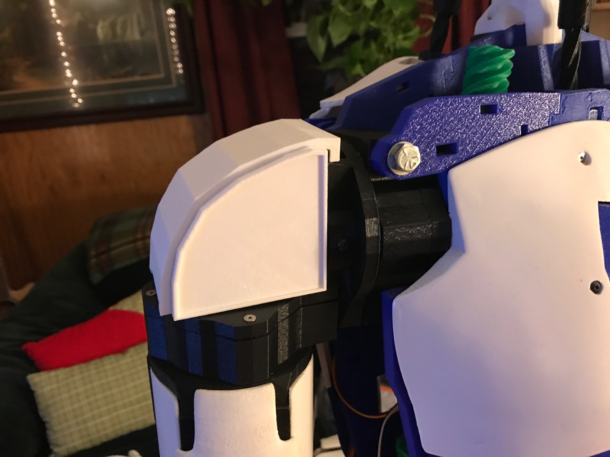 Inmoov shoulder plates in both blank and EZ robot logo