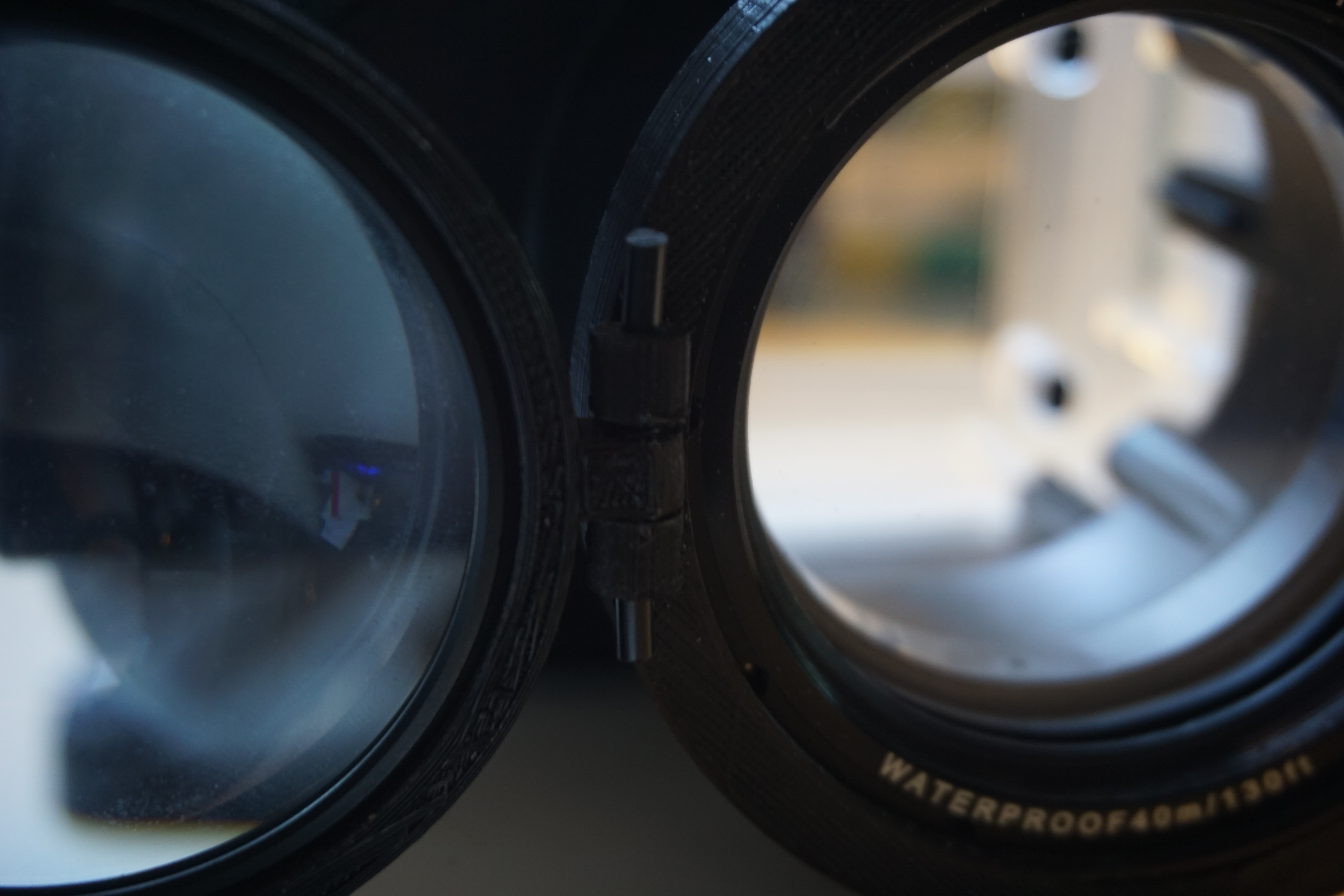 Flip lens holder for Meikon underwater camera housing