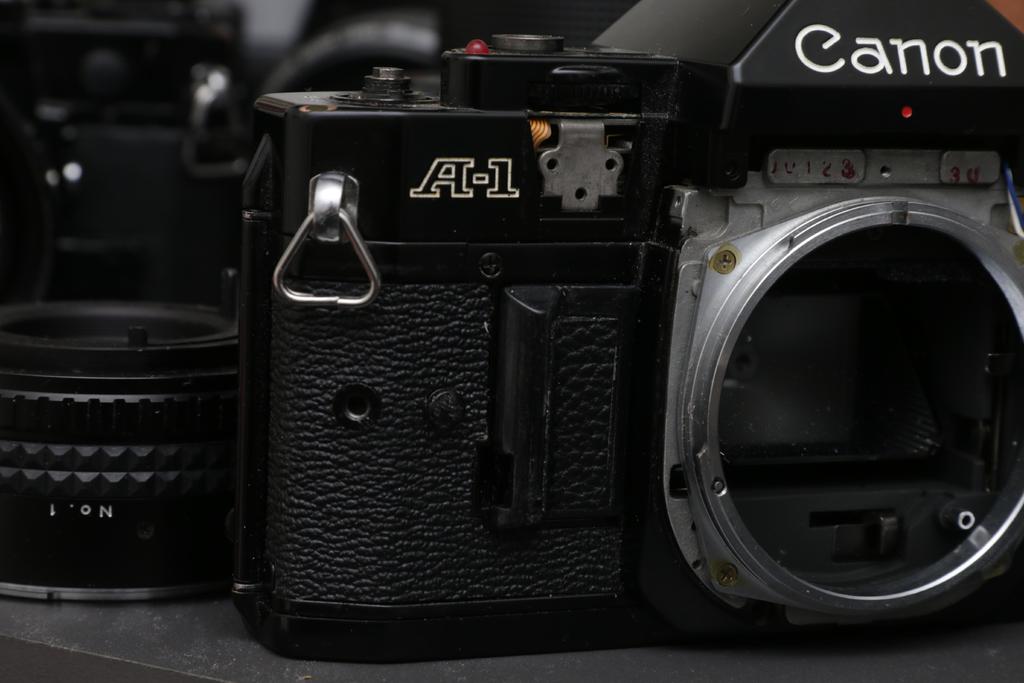 canon a-1_ae-1 battery door