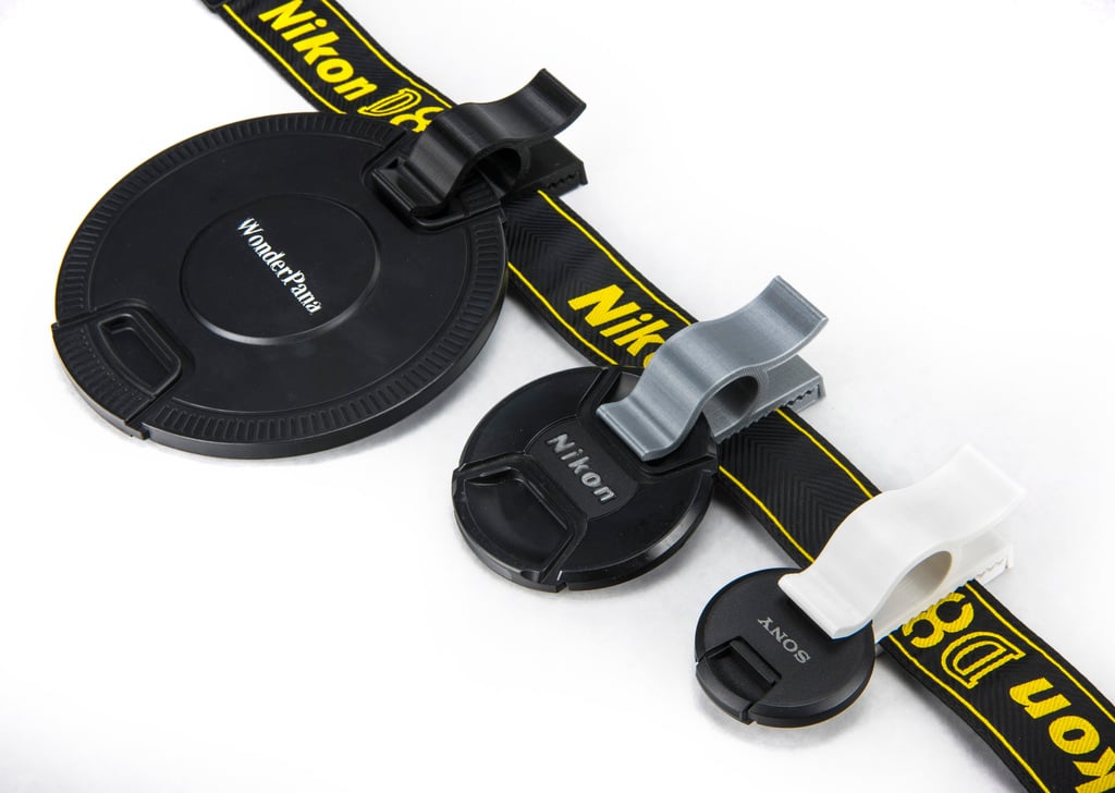 The Clip-On Lens Cap Holder