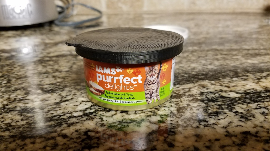 Can lid for Iams cat food can