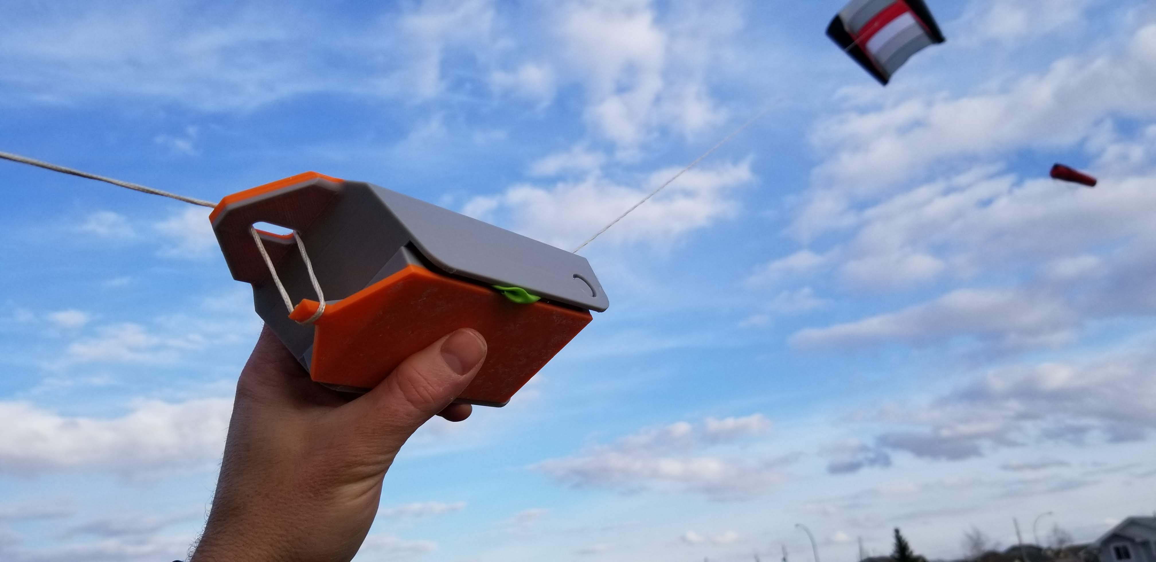 Kite cargo dropper
