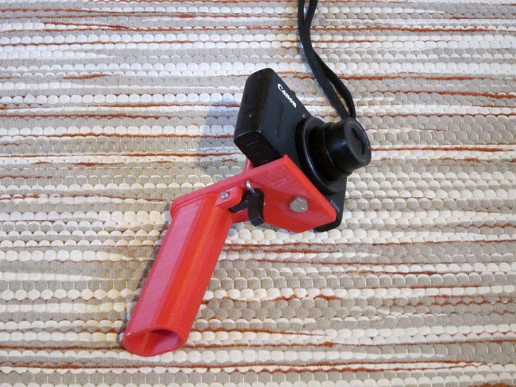 Pistol handle for pocket or action camera