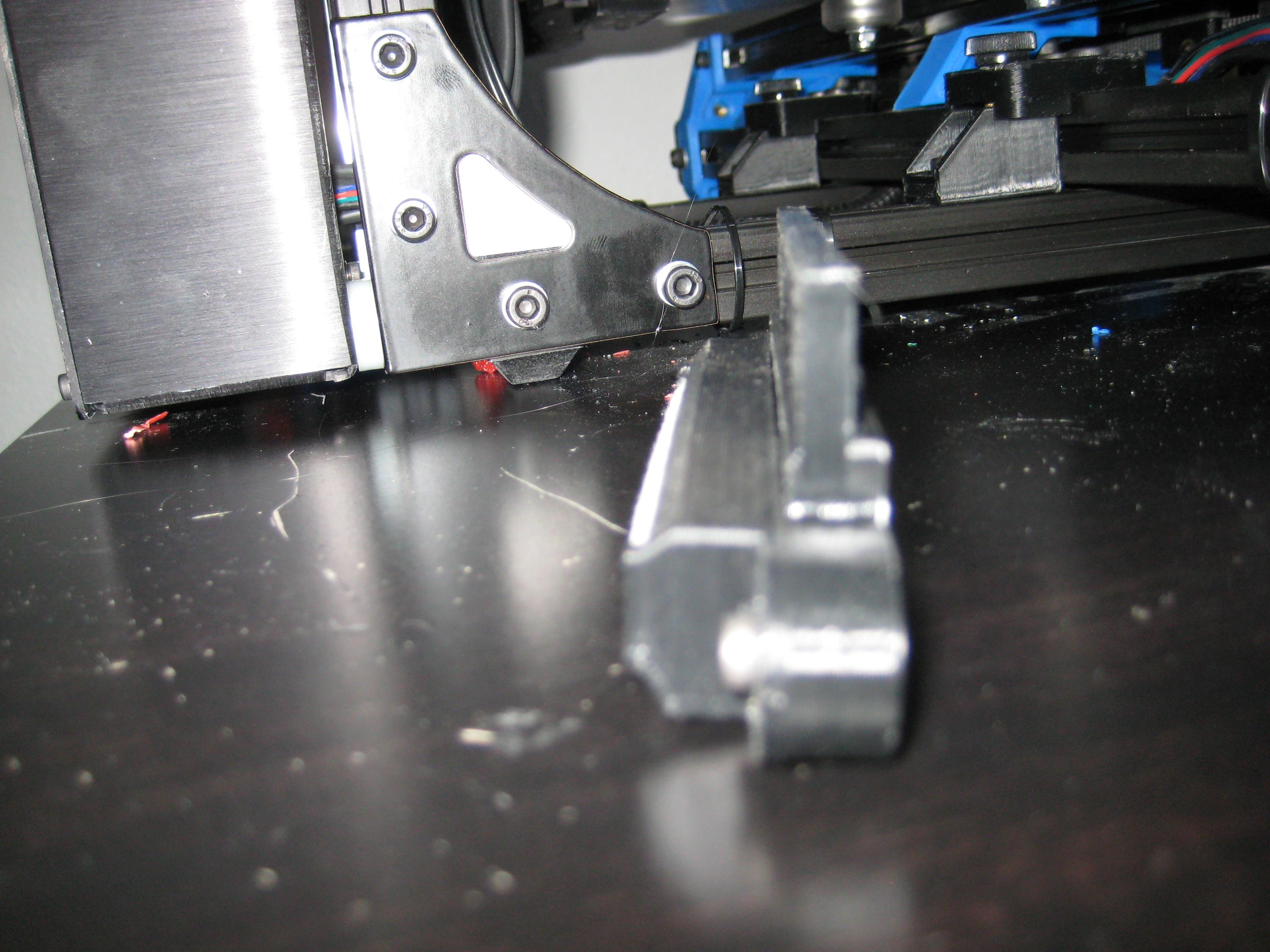 Retrofit Nozzle wiper for mounting a Lulzbot Mini style bed wiper to a Taz or other printer