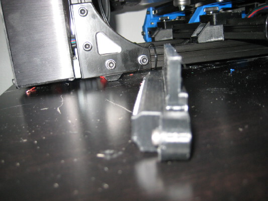 Retrofit Nozzle wiper for mounting a Lulzbot Mini style bed wiper to a Taz or other printer | 3d print model