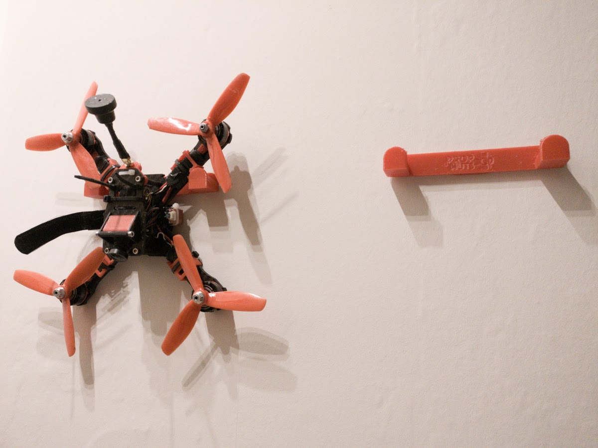 Simple Quadcopter Wall Hanger (for 3M Command strips, variants available)