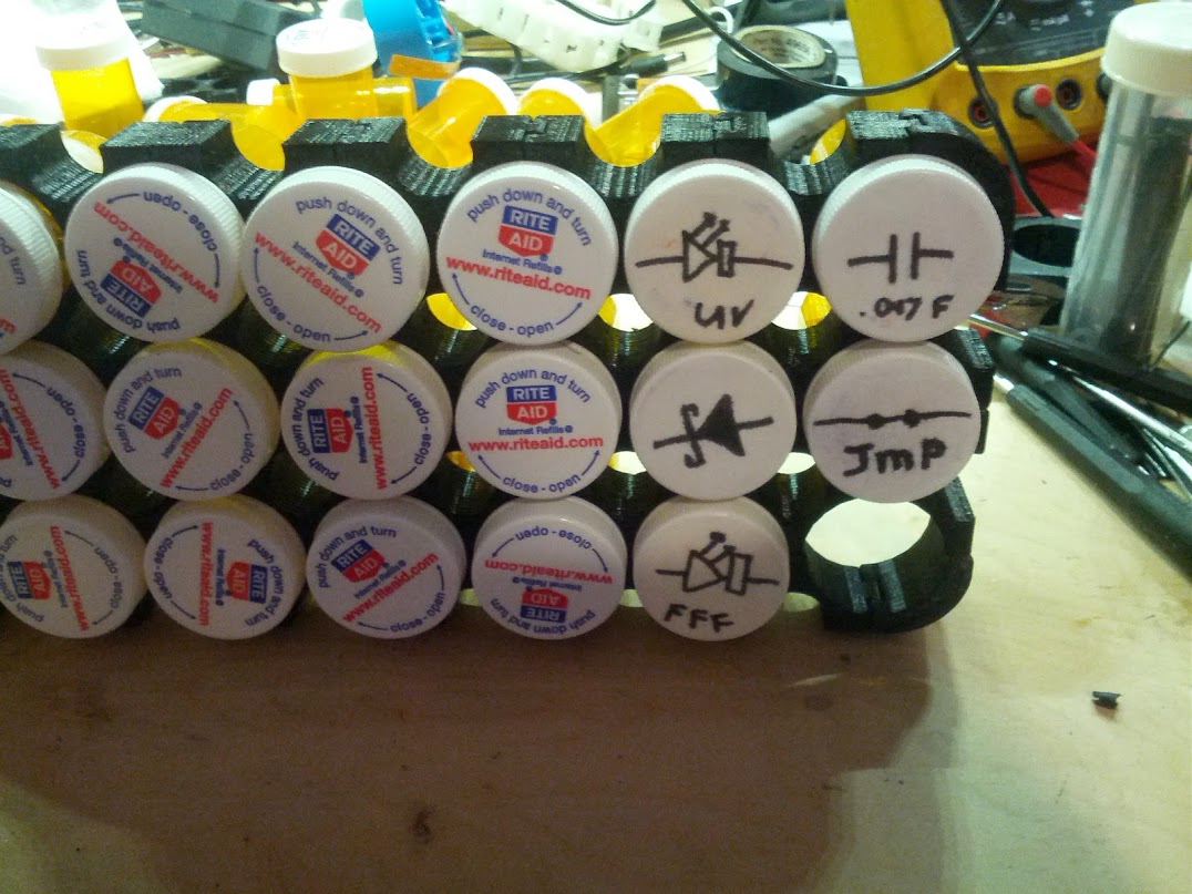 Pill bottle parts rack
