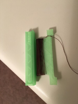 Emergency sewing kit spool with needle storage compartment | 3d print model