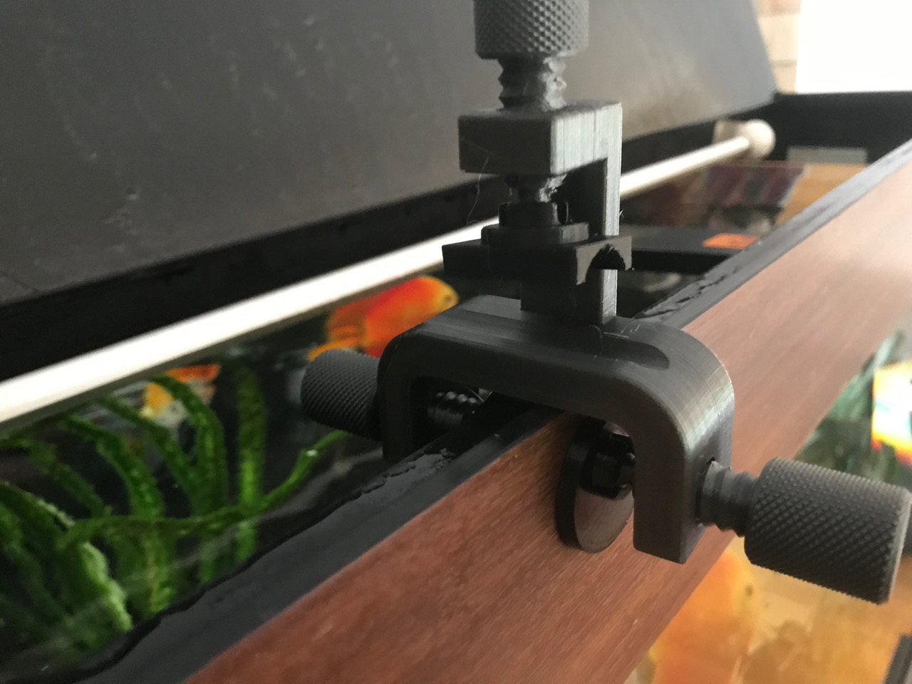 Aquarium water change hose holder clamp