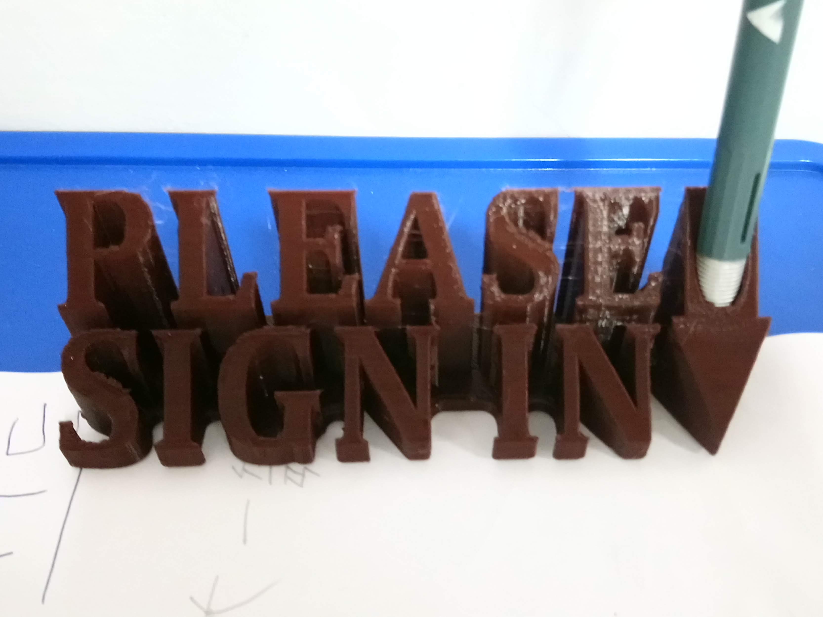 Desk sign "Please Sign In" with arrow pen holder