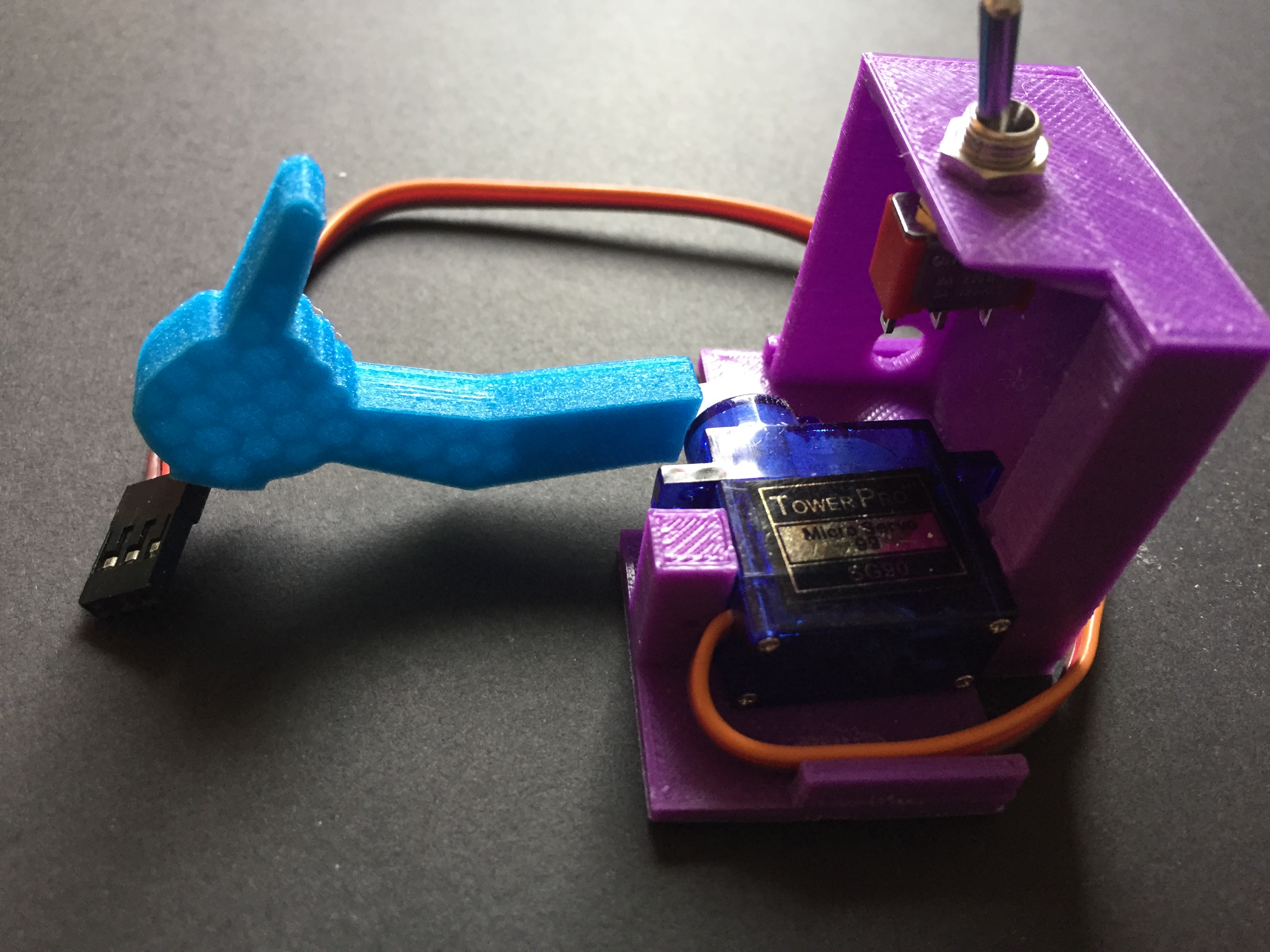 Finger and bracket mounting for useless box