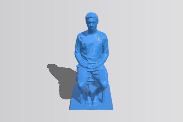 A Young man sitting on a chair | 3d print model